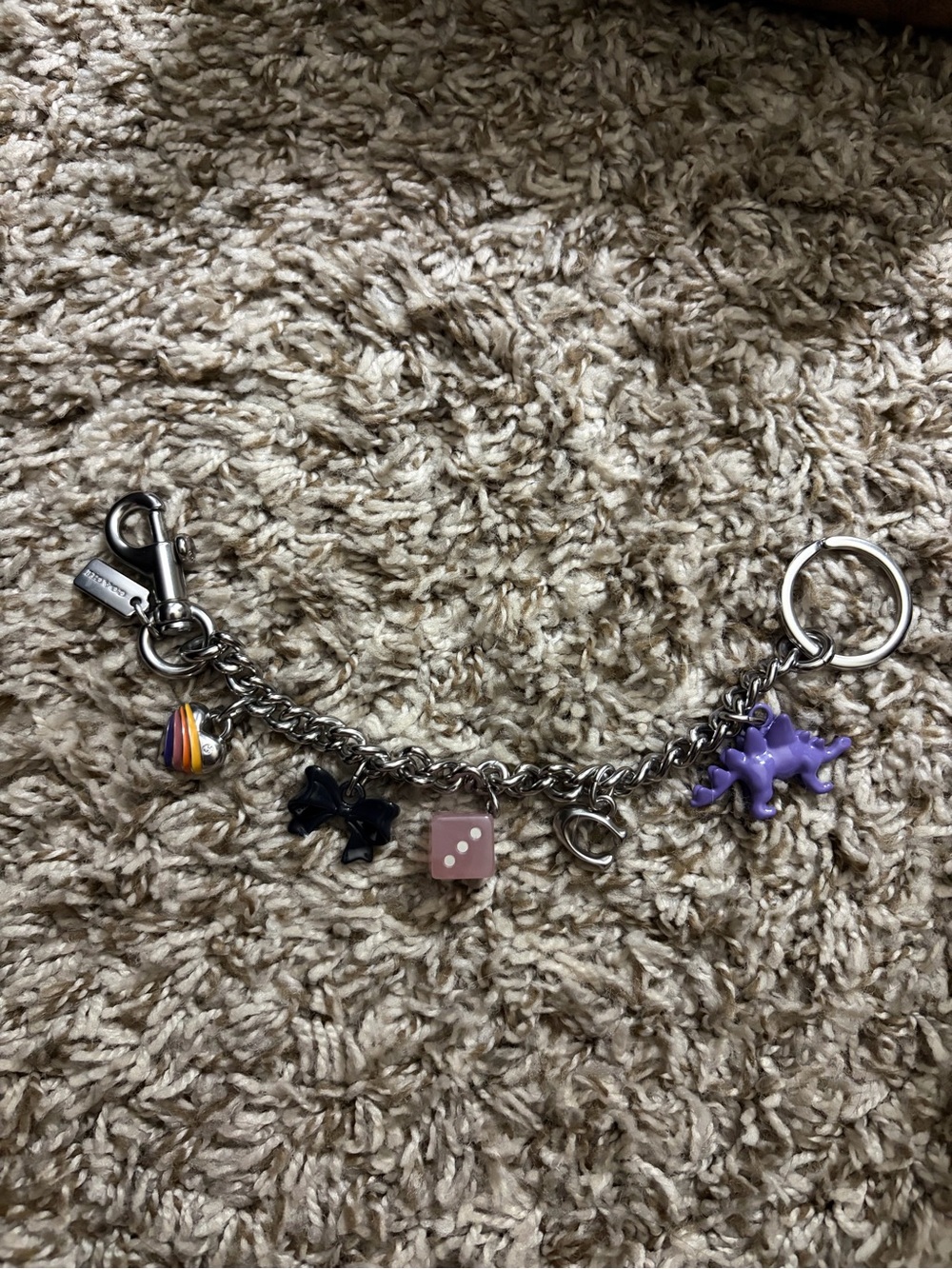 Coach silver chain charm